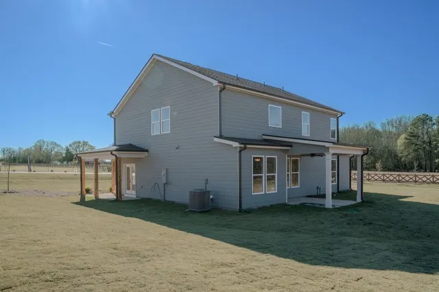 a view of a building with sitting area