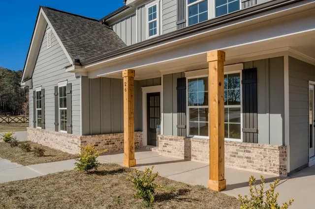 a view of a balcony with a ocean view