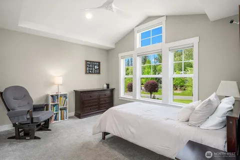 a bedroom with a bed and furniture