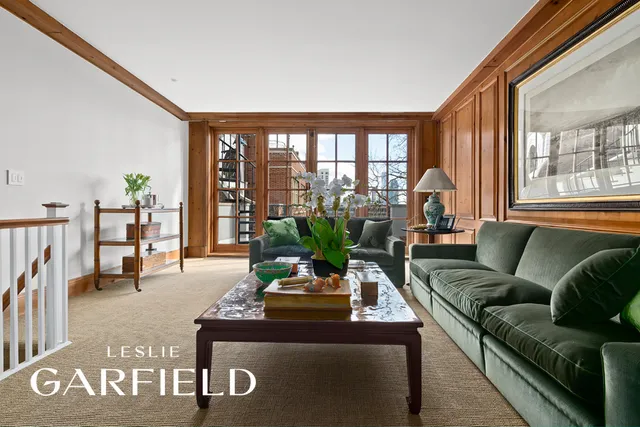 a spacious bedroom with a bed and a window