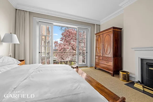 a view of a chairs and table in the patio