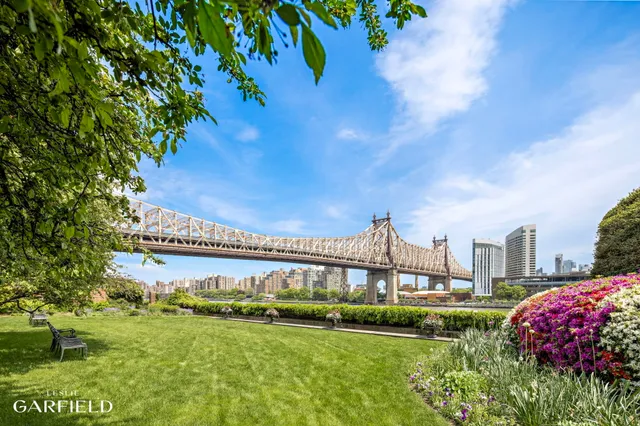 a view of a lake with a garden
