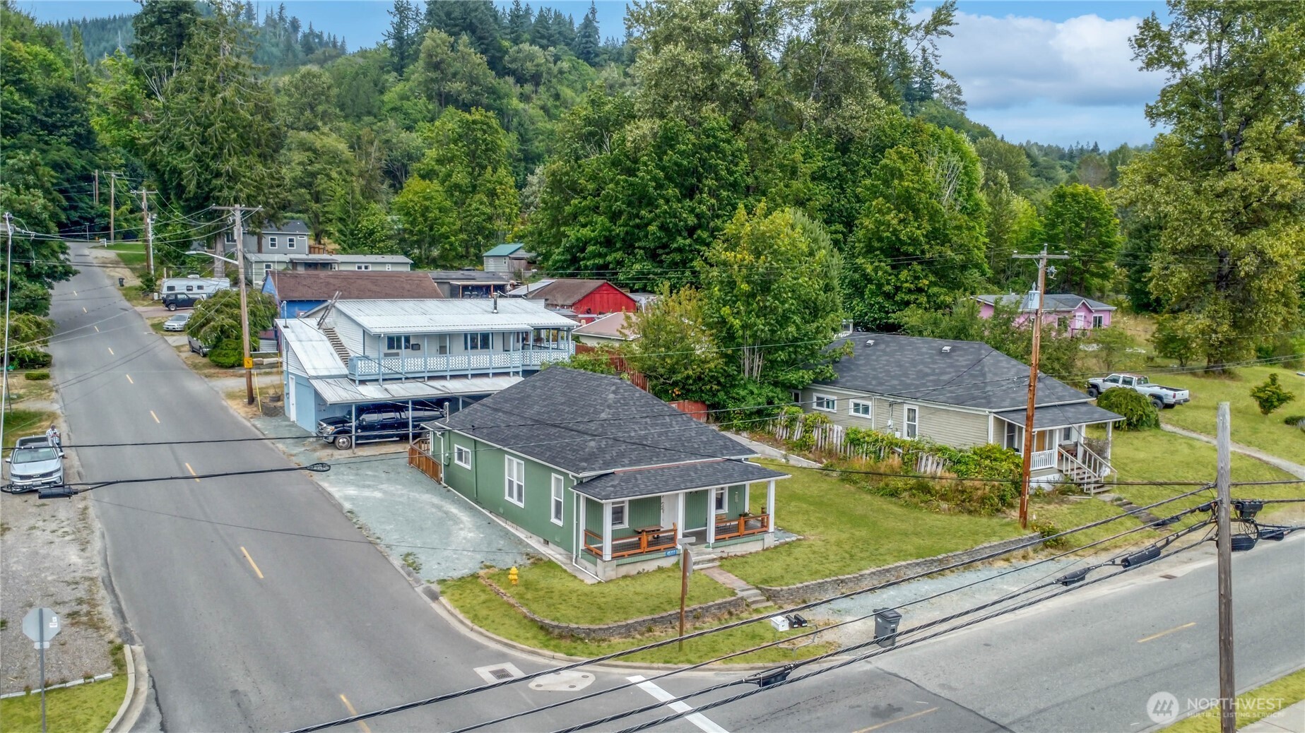 an aerial view of a house with a garden