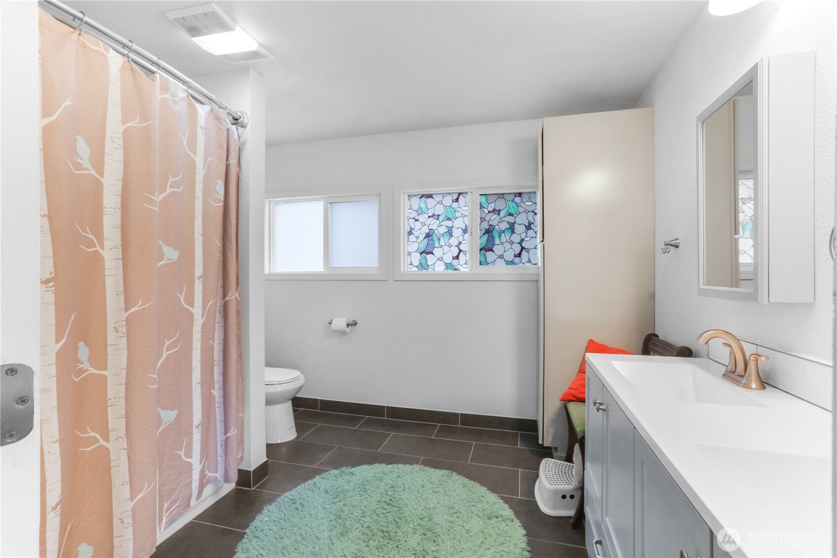 45337 Main Street Concrete, WA 98237 - Photo 18 of 40 a bathroom with a sink and a mirror