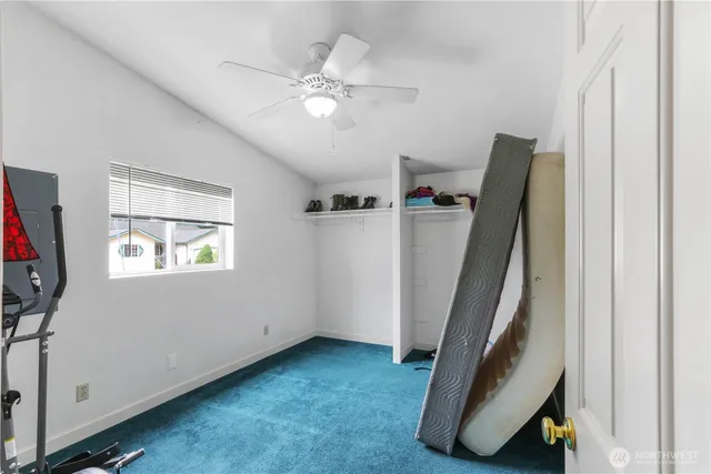 a view of a livingroom with furniture and entryway