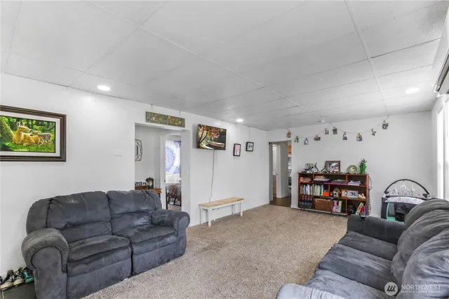 a living room with furniture and a couch
