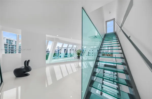 a bathroom with a bathtub and a sink