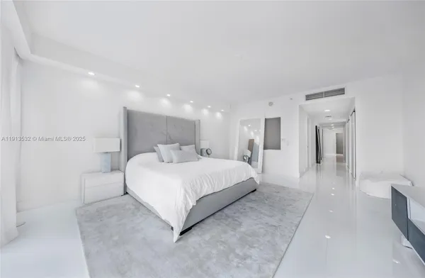 a kitchen with stainless steel appliances a stove a sink and a microwave