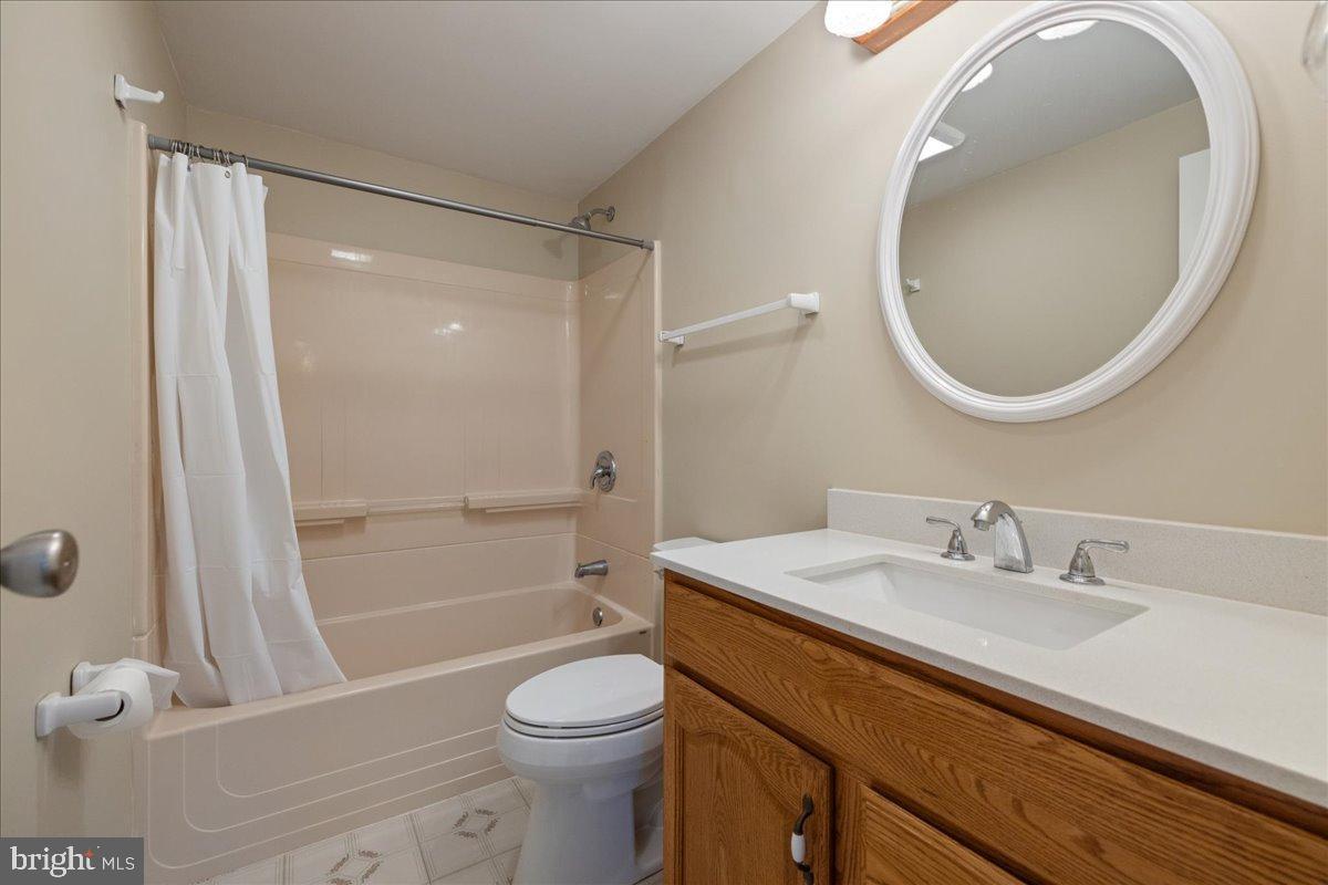 563 Deep Run Road Perkasie, PA 18944 - Photo 16 of 61 a bathroom with a sink a toilet and a mirror