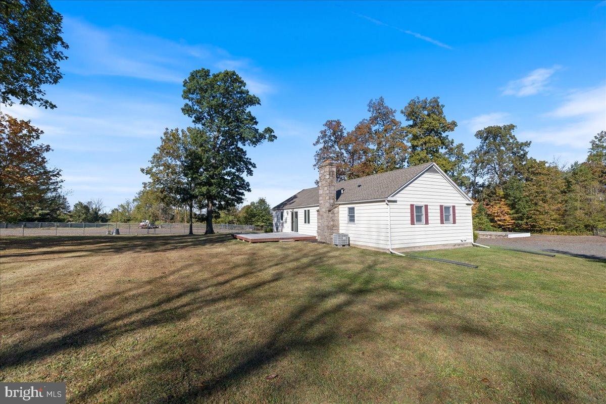 563 Deep Run Road Perkasie, PA 18944 - Photo 27 of 61 a view of big yard next to a house with large trees