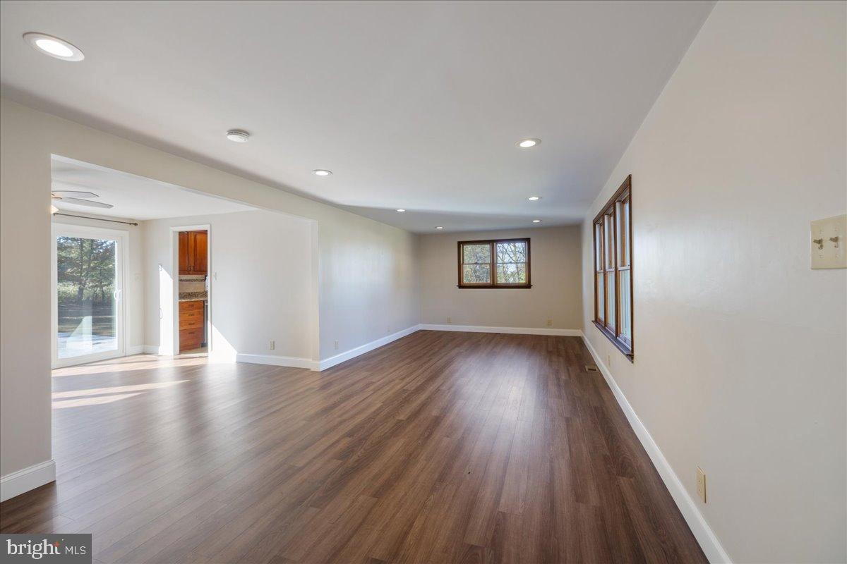 563 Deep Run Road Perkasie, PA 18944 - Photo 3 of 61 a view of an empty room with wooden floor and a window