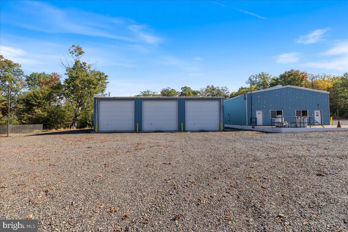 563 Deep Run Road Perkasie, PA 18944 - Photo 32 of 61 a house with trees in the background