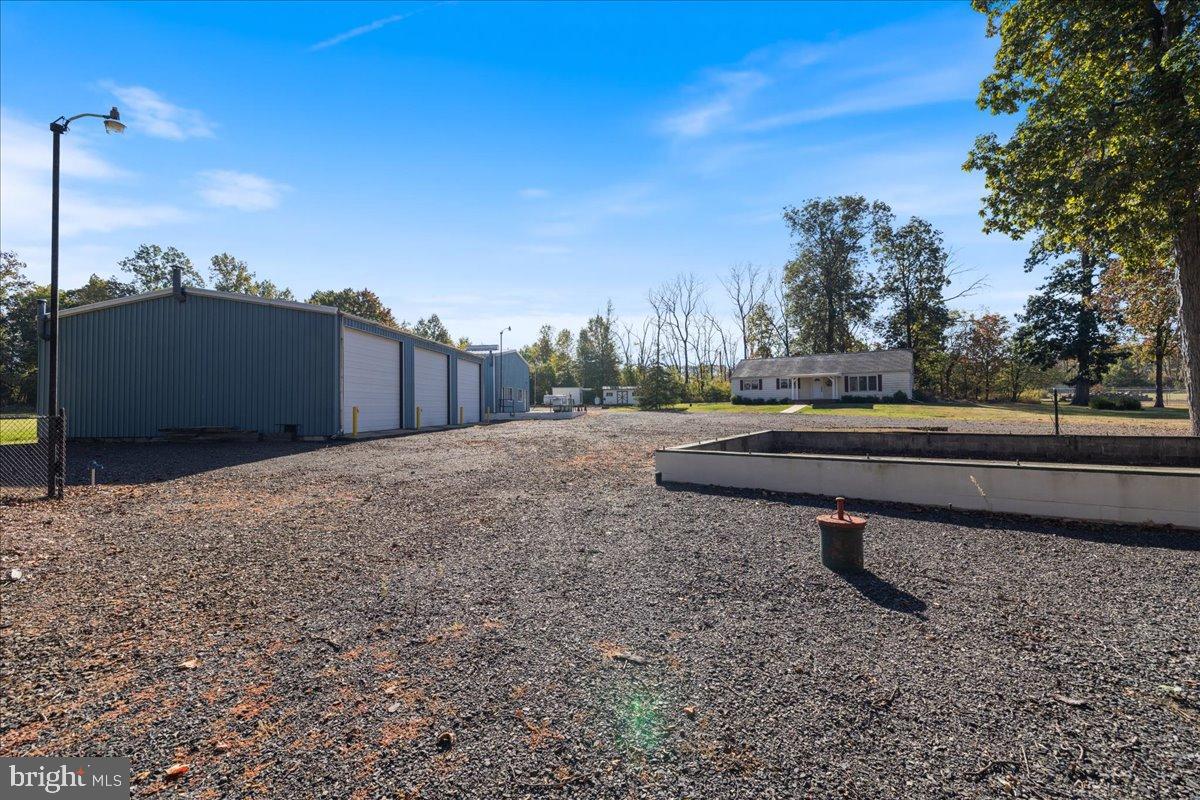 563 Deep Run Road Perkasie, PA 18944 - Photo 33 of 61 a park view with a bench in roof