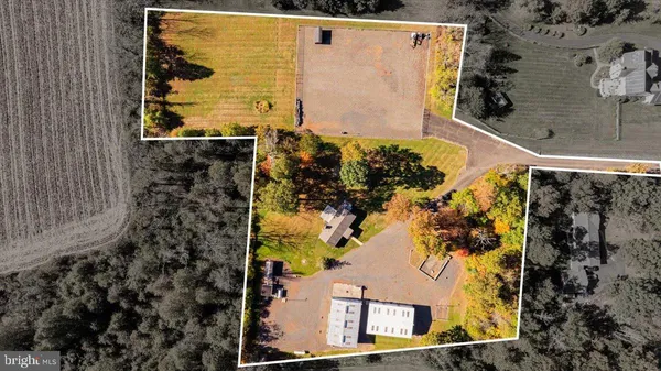 an aerial view of residential house with outdoor space