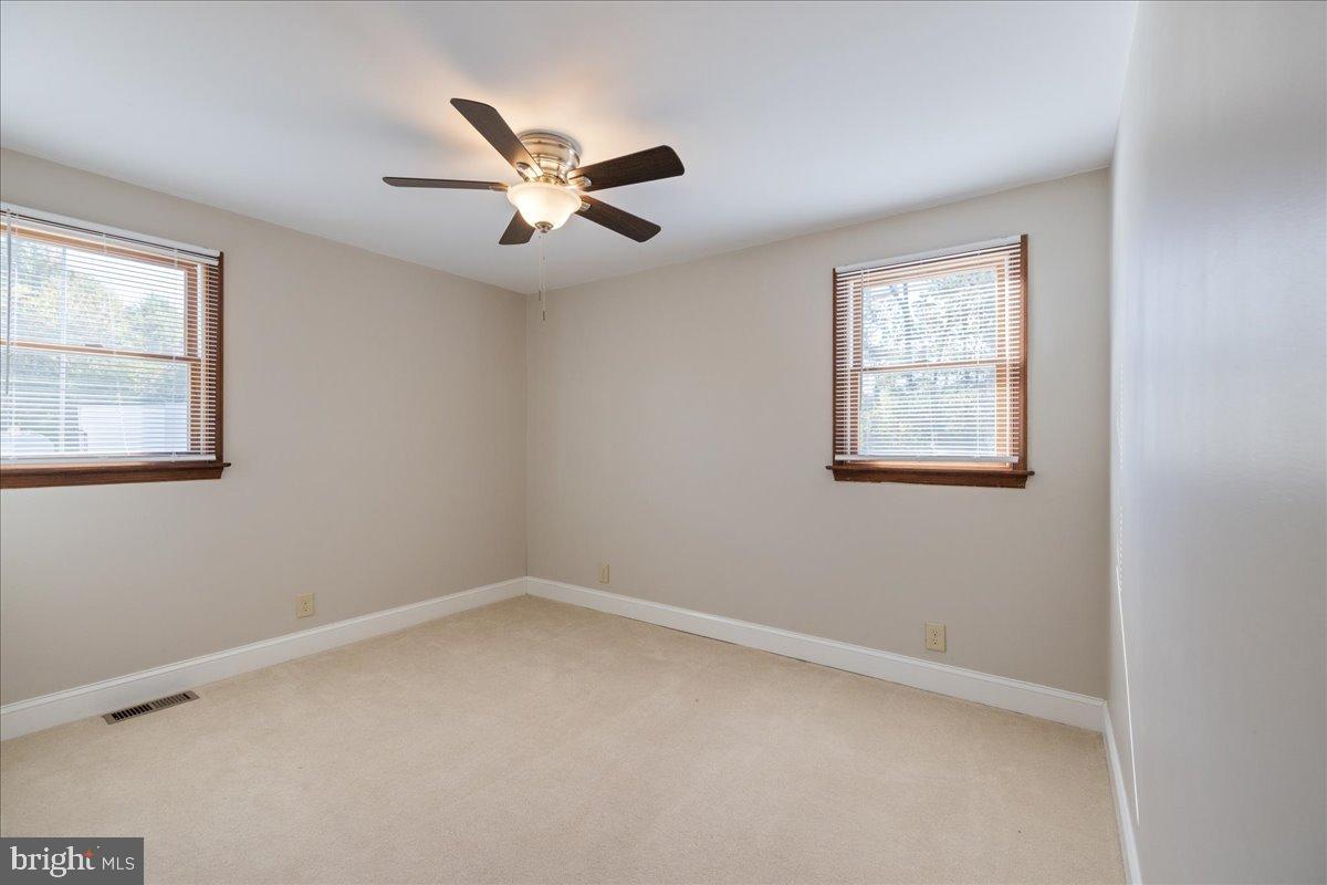 563 Deep Run Road Perkasie, PA 18944 - Photo 10 of 61 an empty room with windows and fan
