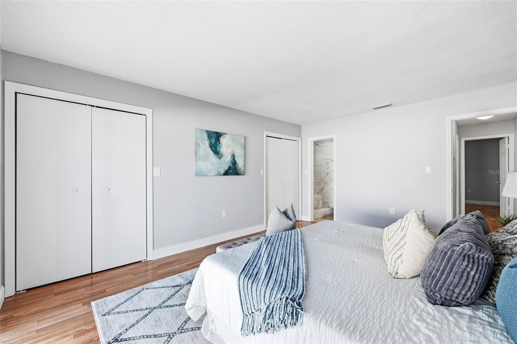 8233 Redfield Drive Port Richey, FL 34668 - Photo 22 of 36 a bedroom with a bed and a window