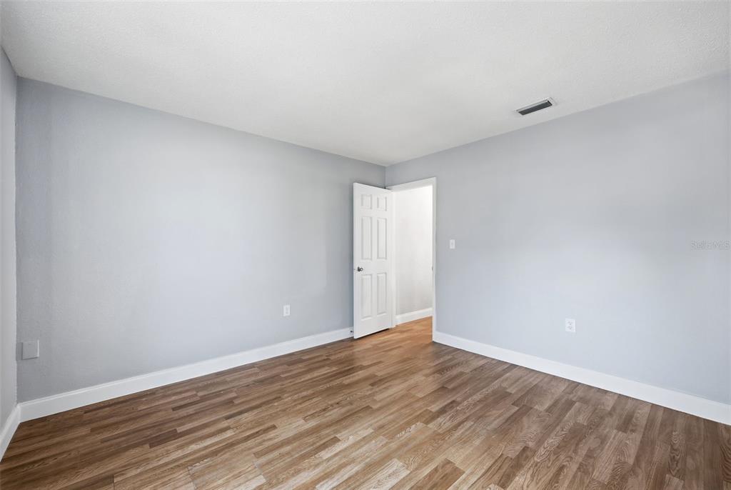 8233 Redfield Drive Port Richey, FL 34668 - Photo 28 of 36 a view of an empty room
