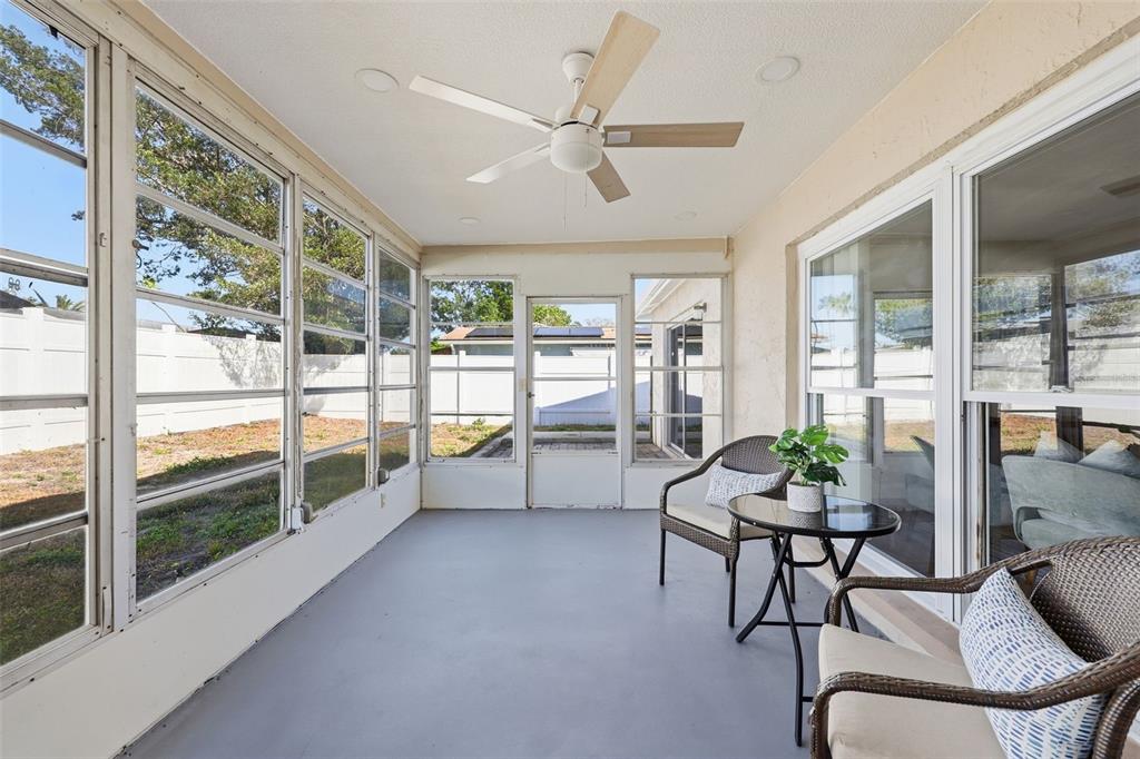 8233 Redfield Drive Port Richey, FL 34668 - Photo 31 of 36 a work room with furniture and a large window
