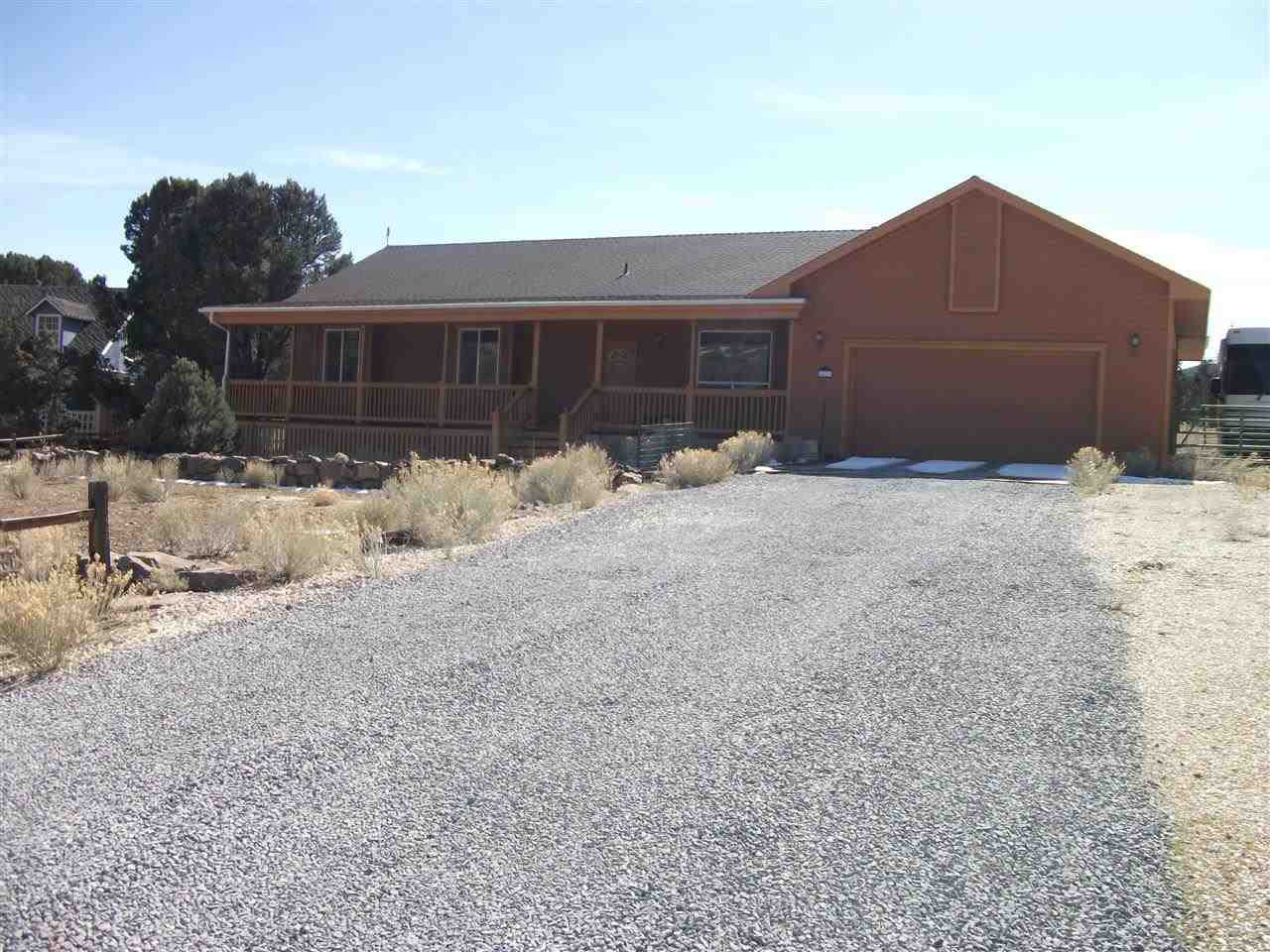2477 Cartwright Road Reno, NV 89521 - Photo 1 of 1 a front view of a house with a yard