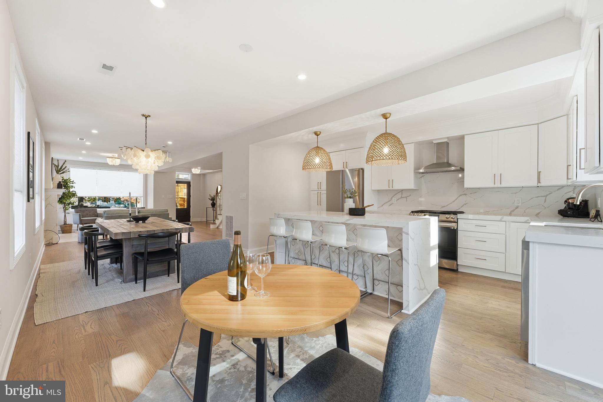 1524 Allison Street Northwest Washington, DC 20011 - Photo 19 of 85 a view of a dining room with furniture and wooden floor