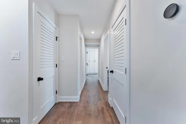 a kitchen with stainless steel appliances granite countertop a refrigerator stove and microwave