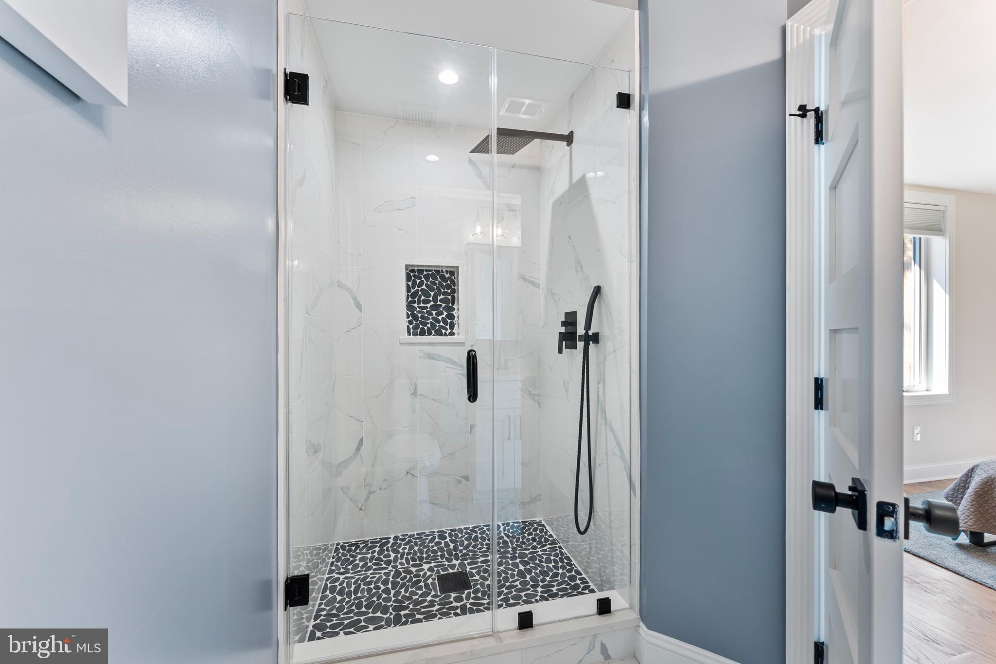 1524 Allison Street Northwest Washington, DC 20011 - Photo 40 of 85 a bathroom with a shower and a sink