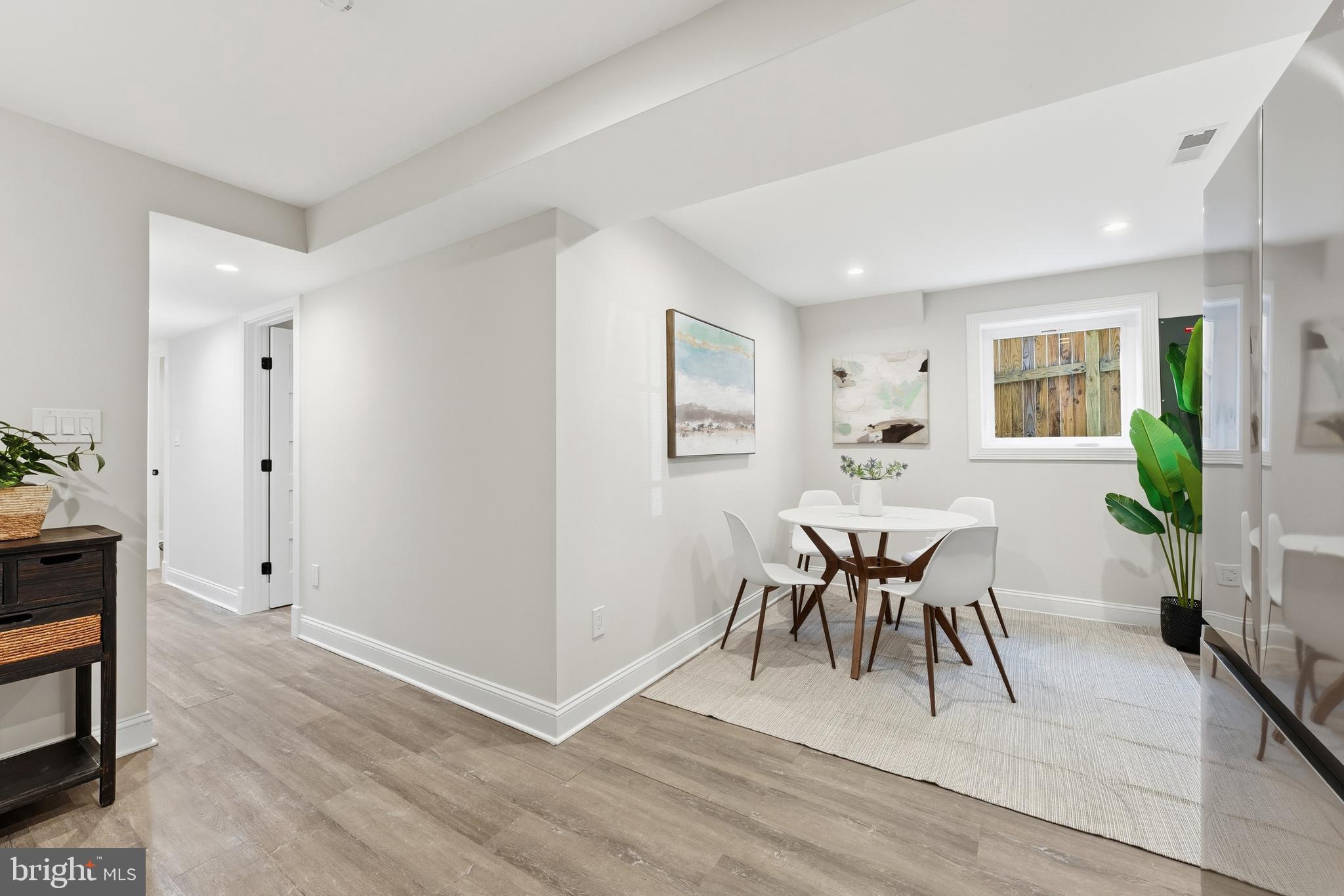 1524 Allison Street Northwest Washington, DC 20011 - Photo 43 of 85 a view of a dining room with furniture and wooden floor
