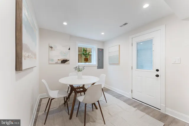 a picture of a bathroom with a shower