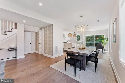 a bathroom with a sink vanity and mirror