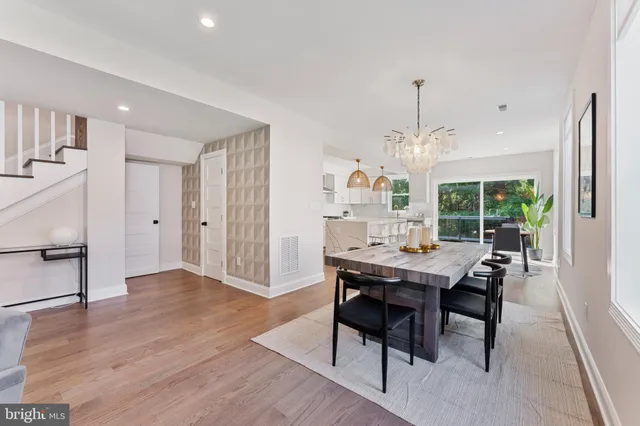 a bathroom with a sink vanity and mirror