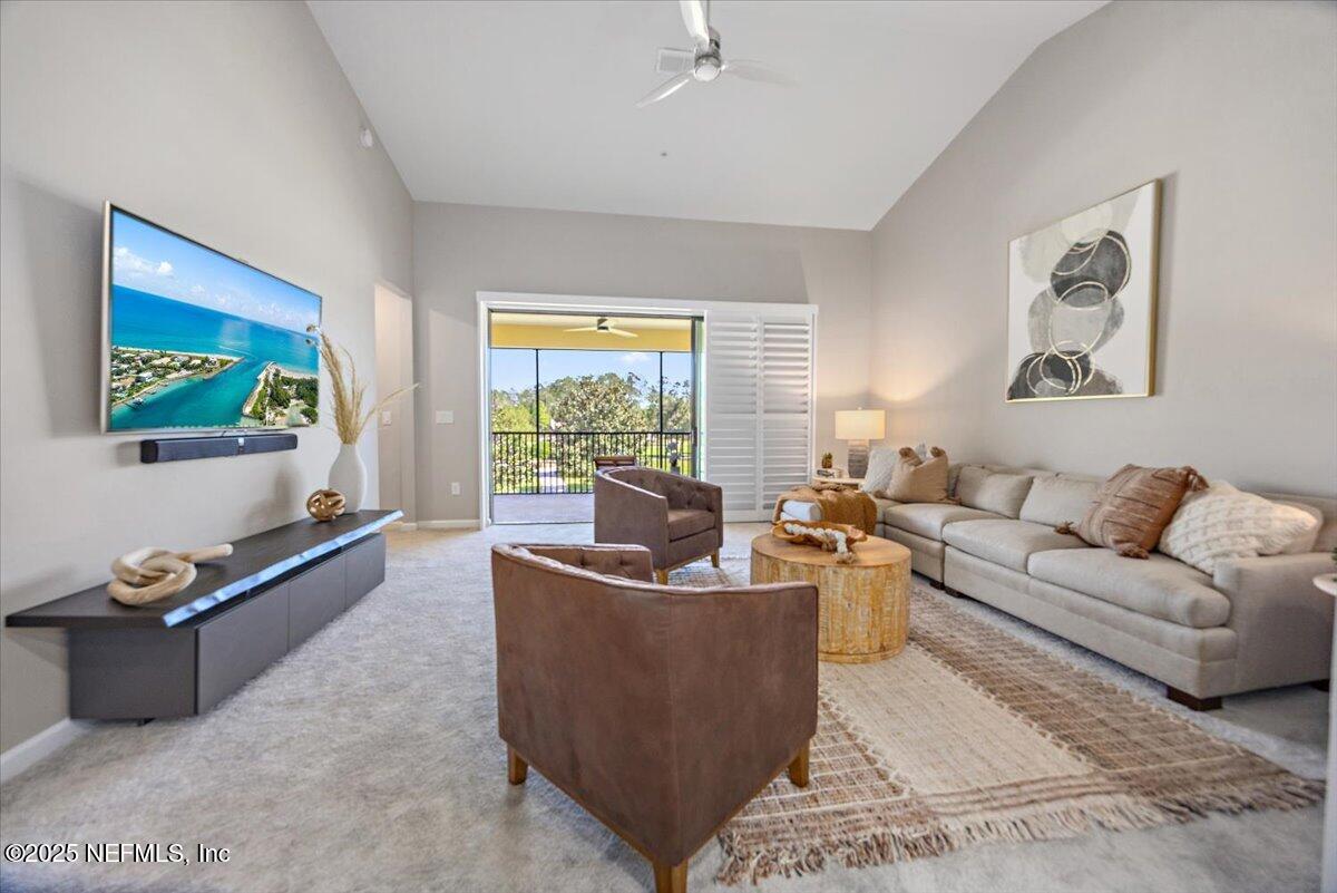 86 Fawn Gully Lane, Unit D Ponte Vedra, FL 32081 - Photo 7 of 29 a living room with furniture and a flat screen tv