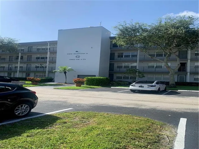 a car parked in front of a house