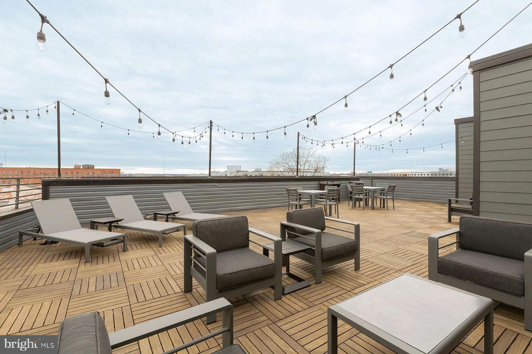 1702 Light Street, Unit 203 Baltimore, MD 21230 - Photo 11 of 14 a view of a terrace with seating area