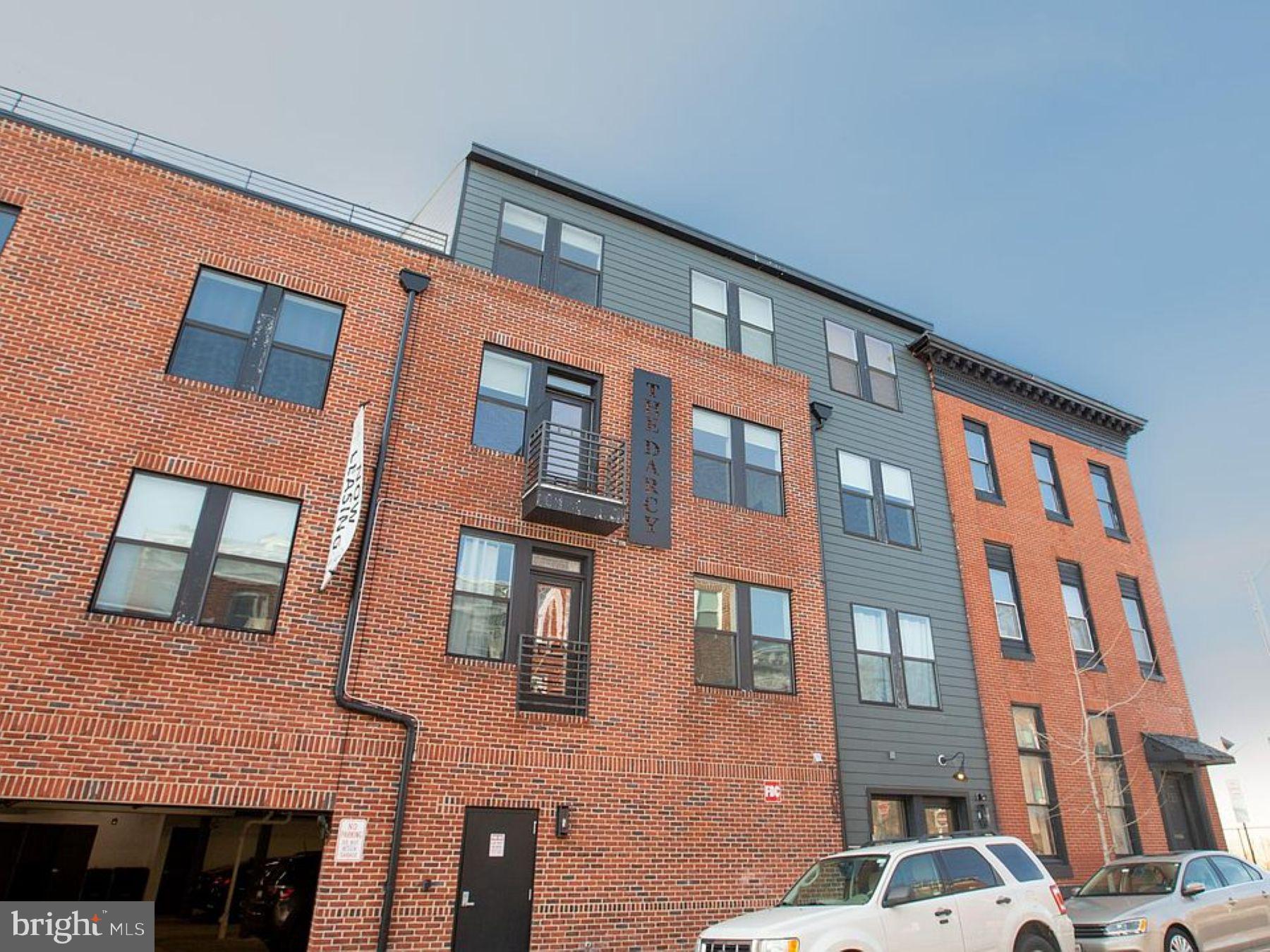 1702 Light Street, Unit 203 Baltimore, MD 21230 - Photo 14 of 14 a front view of a building