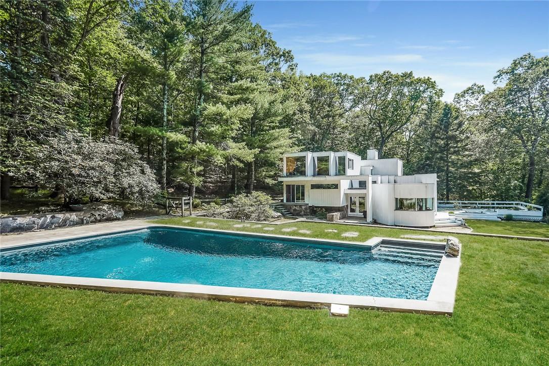 24 Upper Shad Road Pound Ridge, NY 10576 - Photo 1 of 1 Yuko Taskovich stunning contemporary oasis affords privacy yet convenient to town.