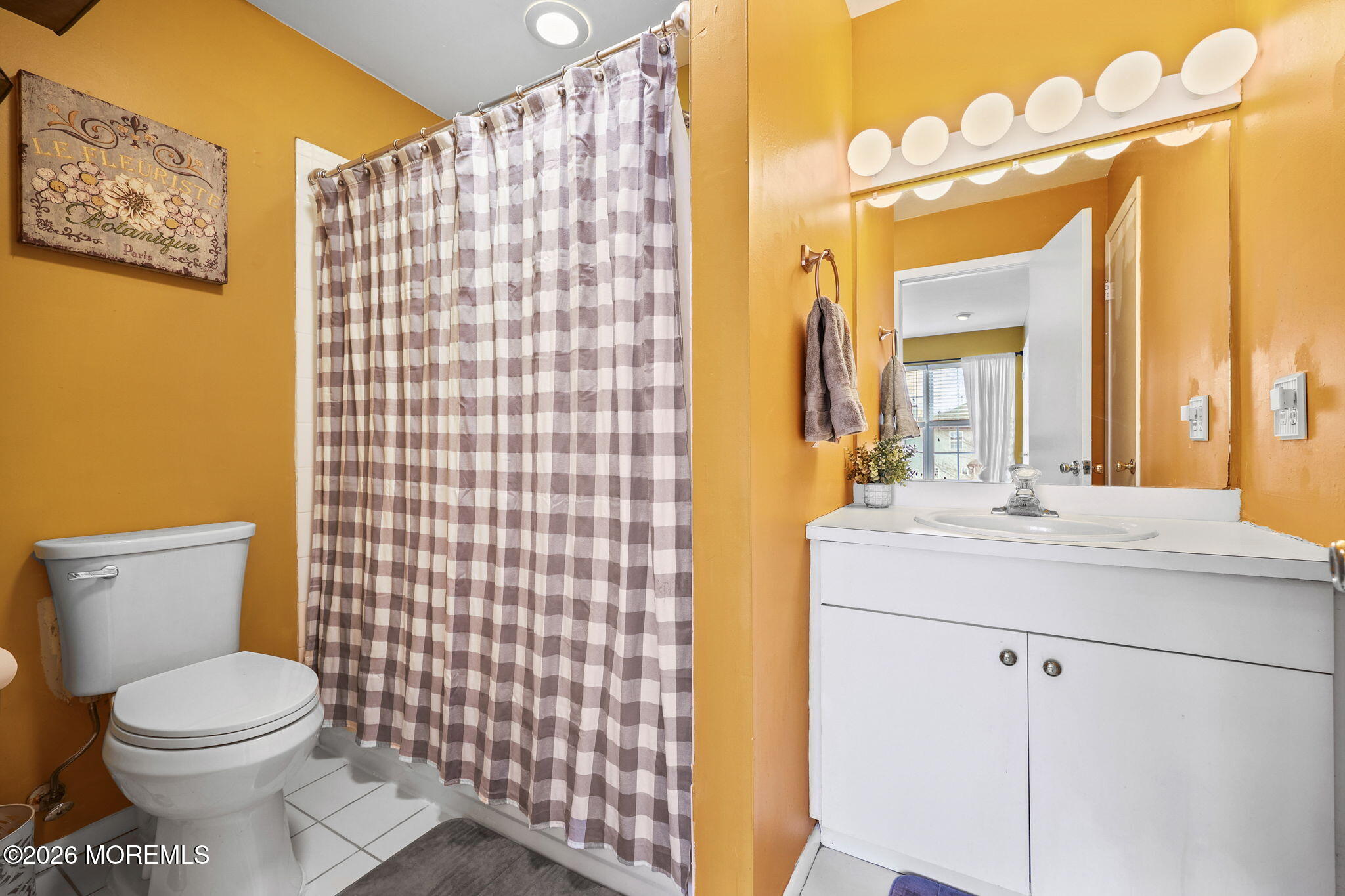 31 Atrium Way, Unit 31 Manalapan, NJ 07726 - Photo 16 of 34 a bathroom with a sink a toilet and shower