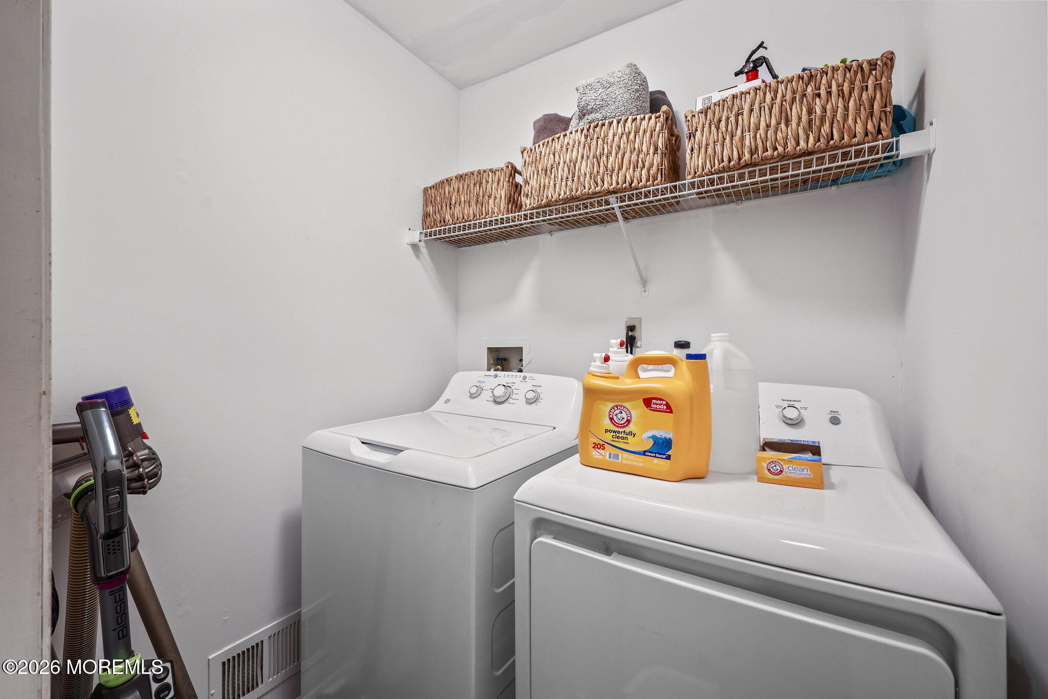 31 Atrium Way, Unit 31 Manalapan, NJ 07726 - Photo 23 of 34 a utility room with dryer and washer