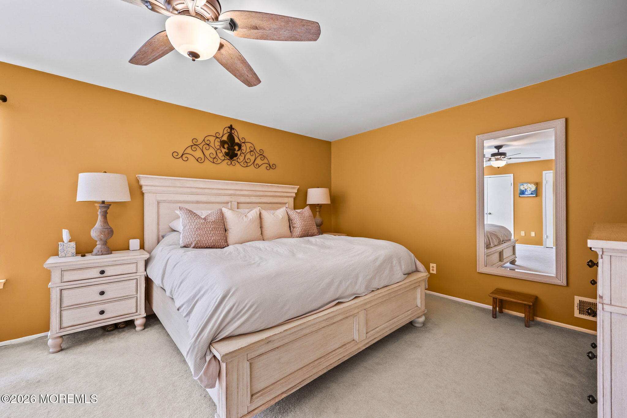 31 Atrium Way, Unit 31 Manalapan, NJ 07726 - Photo 33 of 34 a bedroom with a bed and a chandelier