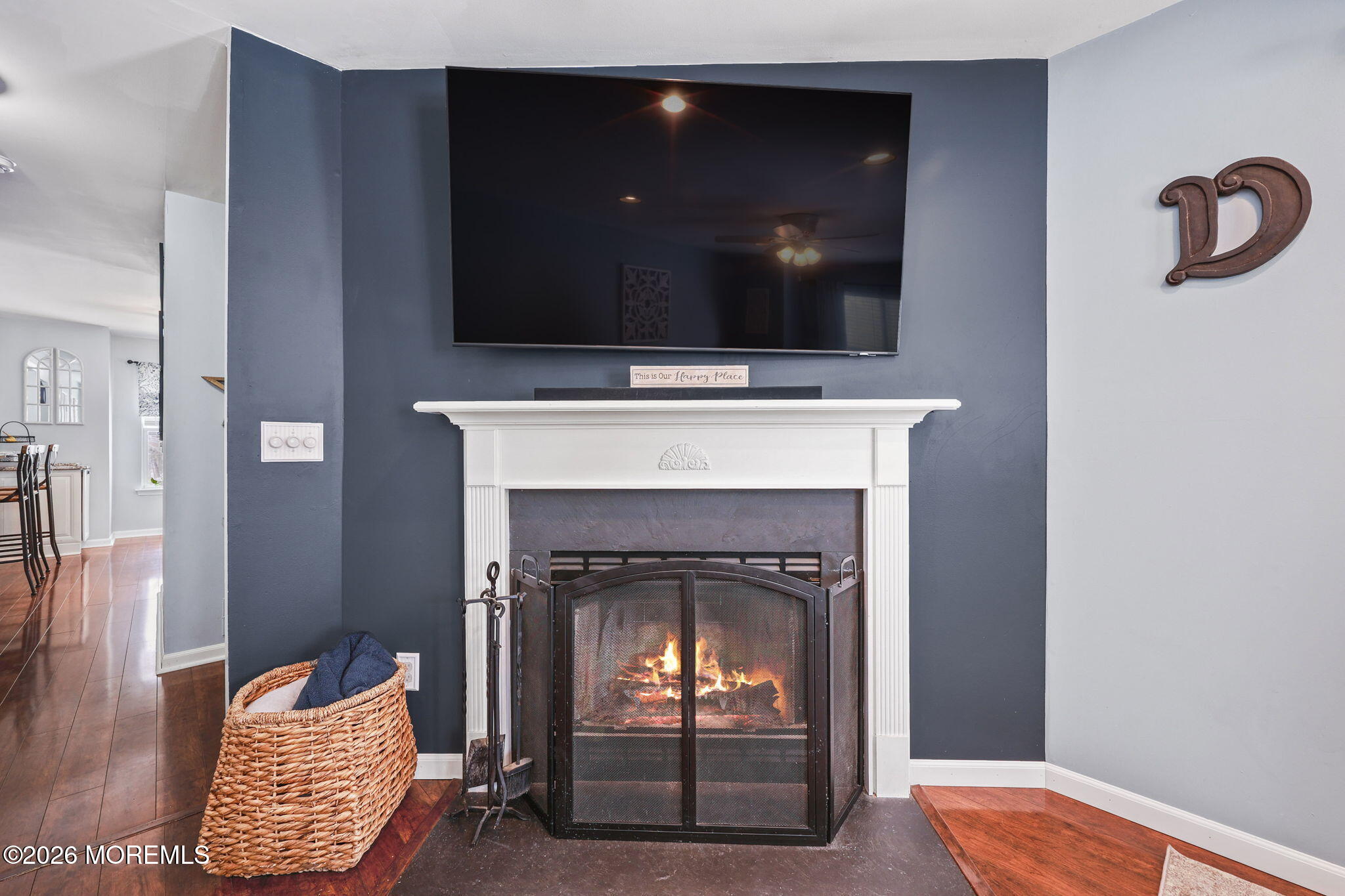 31 Atrium Way, Unit 31 Manalapan, NJ 07726 - Photo 4 of 34 a living room with furniture and a fireplace
