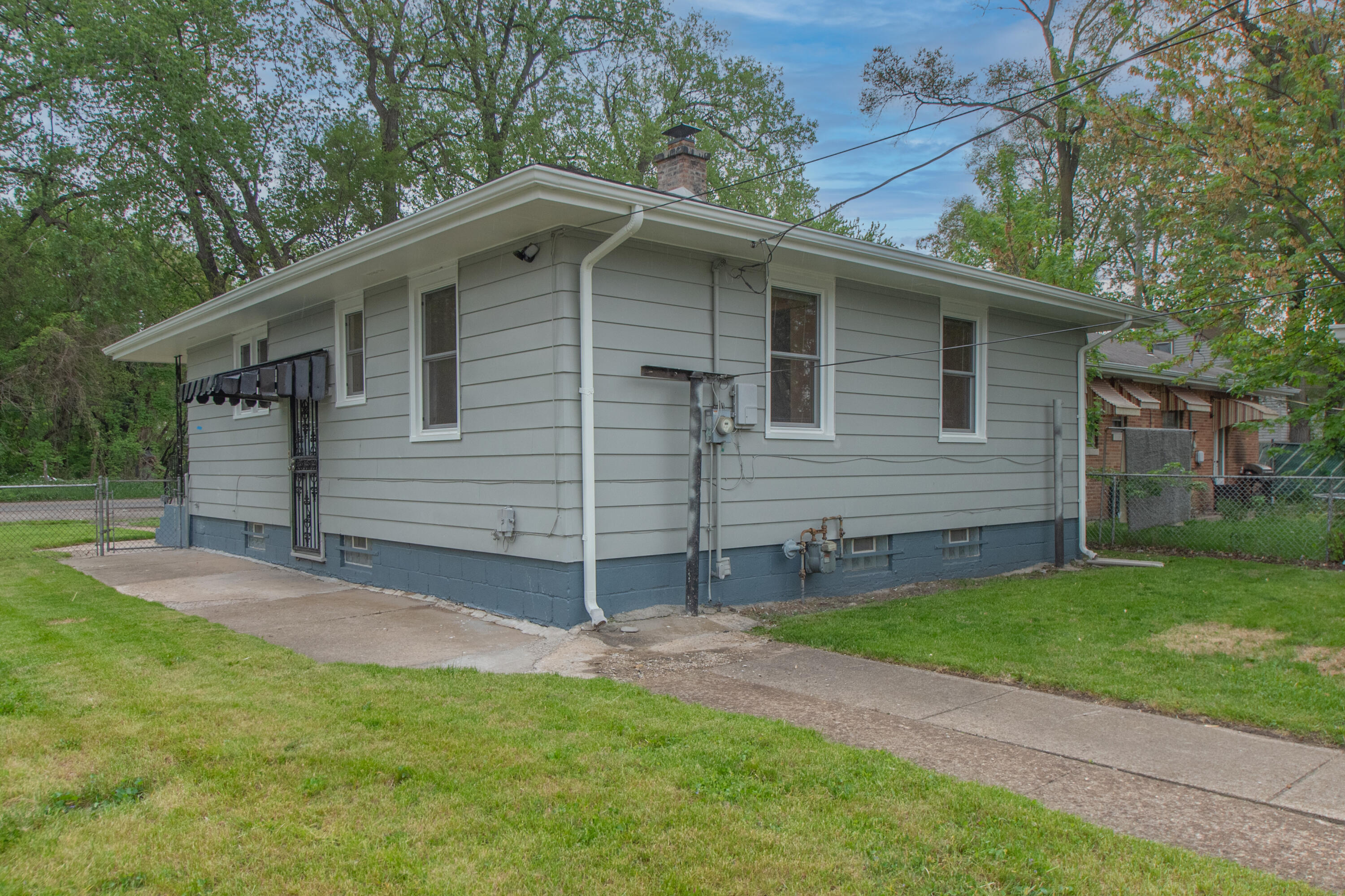 4727 Harrison Street Gary, IN 46408 - Photo 2 of 15 a view of a back yard of the house