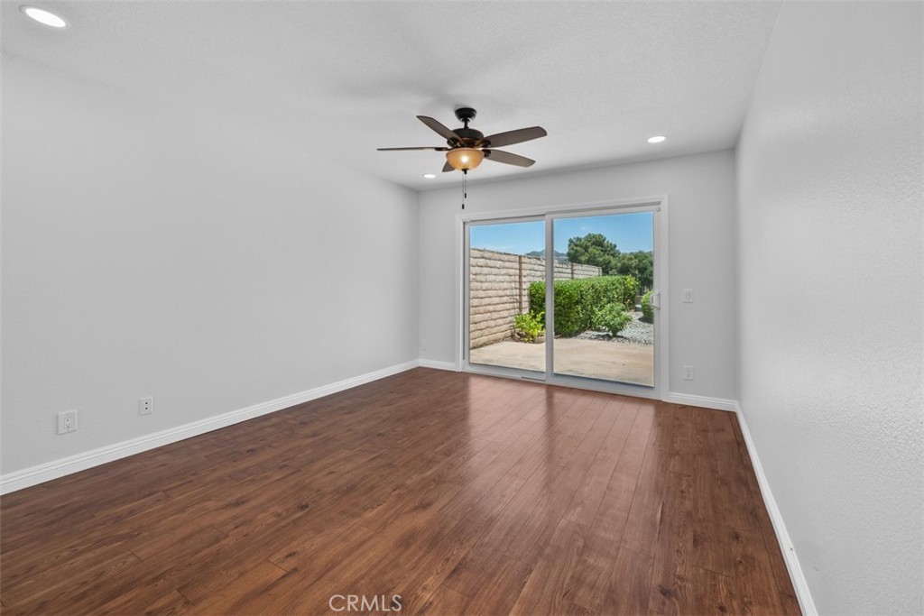 4346 Los Padres Drive Fallbrook, CA 92028 - Photo 17 of 31 wooden floor in an empty room with a window