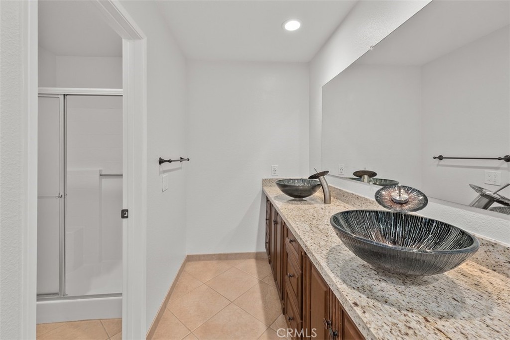 4346 Los Padres Drive Fallbrook, CA 92028 - Photo 19 of 31 a kitchen with granite countertop a sink and a stove