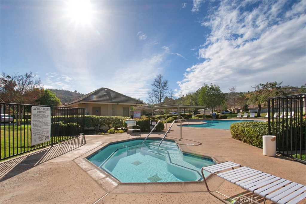 4346 Los Padres Drive Fallbrook, CA 92028 - Photo 29 of 31 a view of a swimming pool with a patio and a garden