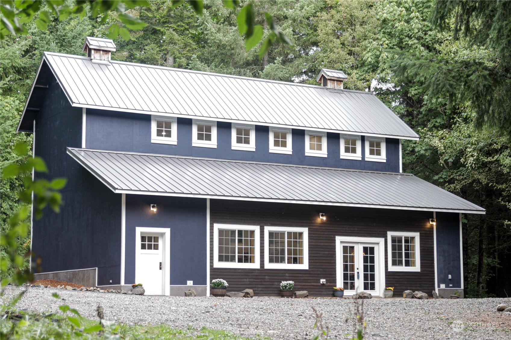 120 Swindler Road Winlock, WA 98596 - Photo 2 of 37 a front view of a house with a garden
