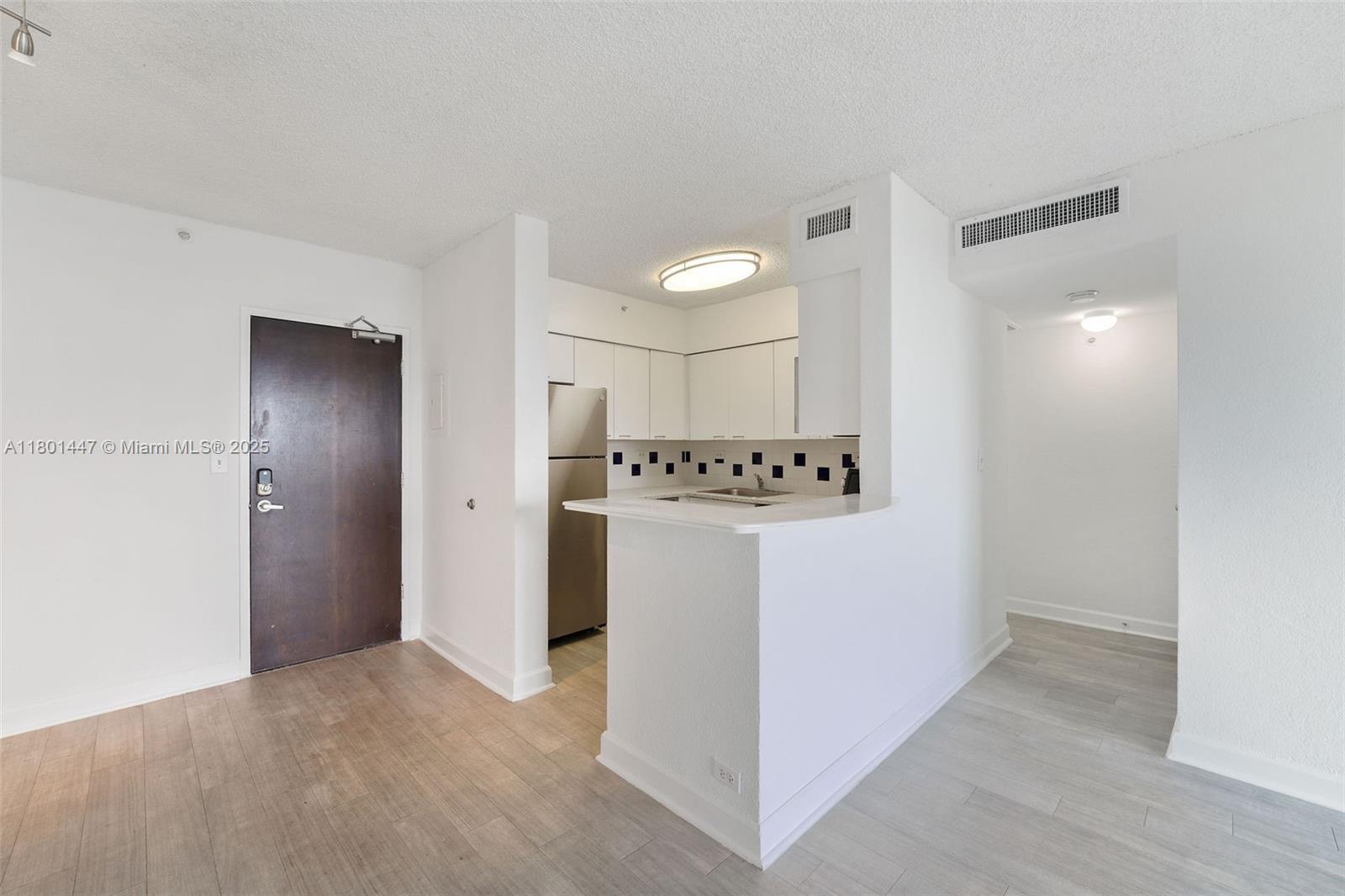 1500 Bay Road, Unit S0380 Miami Beach, FL 33139 - Photo 16 of 83 a view of a storage & utility room with closet