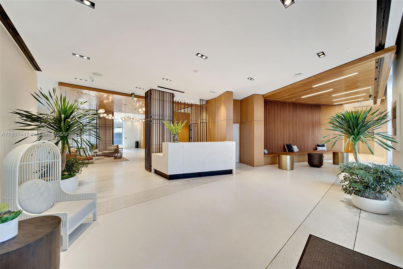 1500 Bay Road, Unit S0380 Miami Beach, FL 33139 - Photo 58 of 83 a living room with furniture and a large window