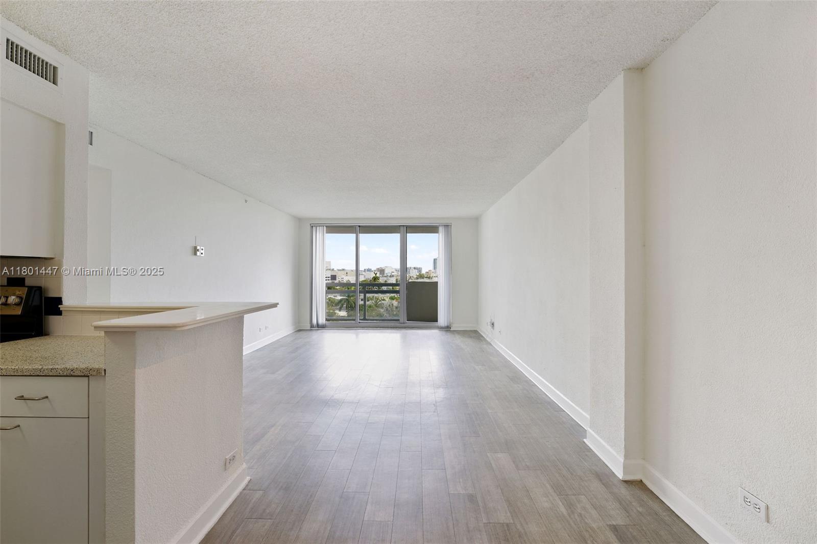 1500 Bay Road, Unit S0380 Miami Beach, FL 33139 - Photo 8 of 83 a view of a kitchen with a sink and a window