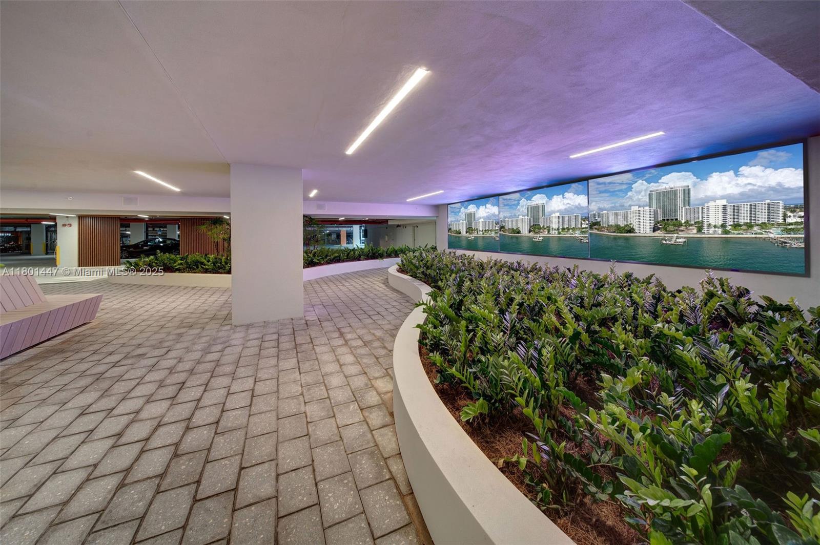 1500 Bay Road, Unit S0380 Miami Beach, FL 33139 - Photo 82 of 83 a patio with table and chairs