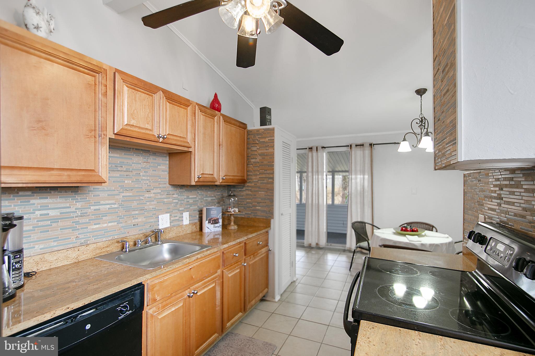 4782 Bonnie Brae Road Baltimore, MD 21208 - Photo 10 of 25 Custom Backsplash and Granite Counters
