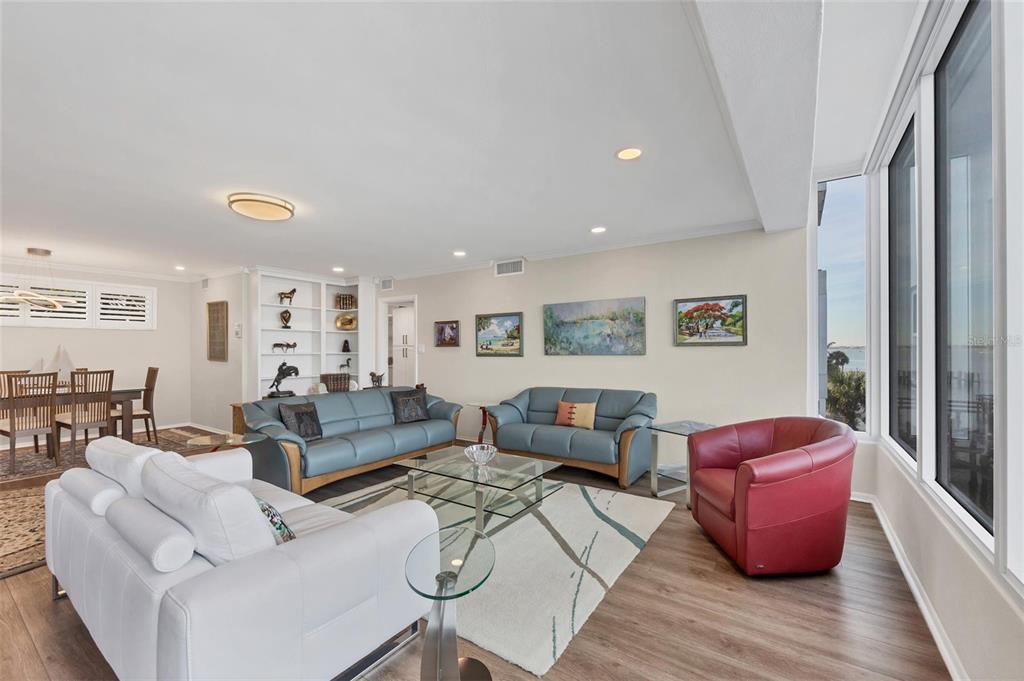 226 Golden Gate Point, Unit 32 Sarasota, FL 34236 - Photo 14 of 60 a living room with furniture or couch and a potted plant